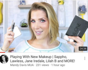 YouTube Image of Nashville Makeup Artist Mandy Davis holding new products for review